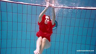 Eye-catching though titless chick with petite ass in underwater solo
