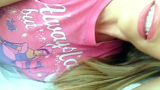 A super sexy brunette massages her big boobs