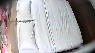 Cute amateur asian web cam girl playing with her toy