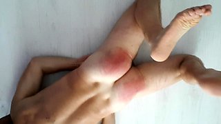 Light femdom and foot fetish play with brunette