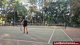 An outdoor strip tennis match with Rafaela and Igor