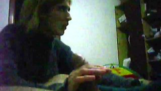 young blonde gives a handjob on friend until he cums