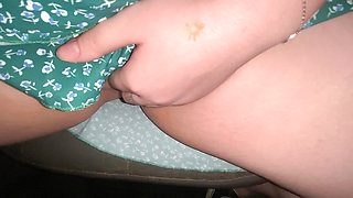 Having fun in the back seat of a taxi while the driver is not looking. Fucking herself with her fingers in the car. Public amateur