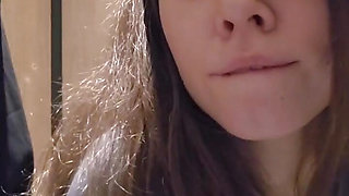 Charming girl teases you very quietly in a public toilet