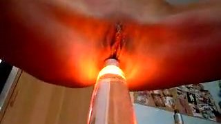 Pierced girl fucks her pussy with a lamp in hot solo scene