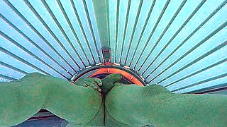 Masturbating in public tanning bed
