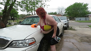 Sexy Mature bbw redhead  Nurse Vicki washes her car!