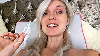 Blonde mature with big boobs masturbates in bed