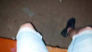 Hot stepmom in heels teases stepson with public footjob outdoors