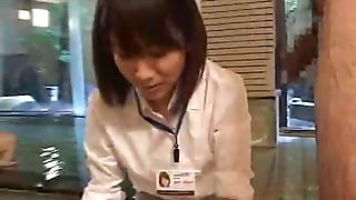 Shy Japanese employee gives out handjobs at hot spring