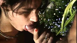 Curvy brunette flashing ass and giving blowjob outdoor