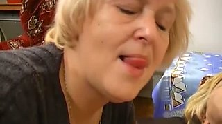 Fat blonde granny takes a piss before giving lesbian show with her GF