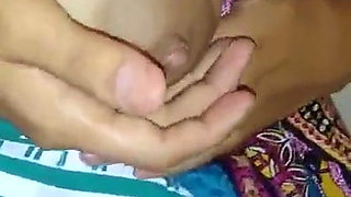 Hot Indian Wife squeezing milk into the glass