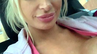 Blonde is flashing her big boobs in the outdoors