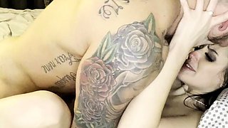 Busty curly brunette with big boobs fucks on couch