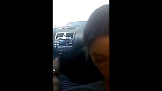 Pierced Brunette Blows in the Car