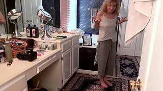Curly Blonde MILF Strips And Gives Wet Shower Blowjob