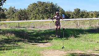 The submissive slave is being punished by having to put on a show for her fans on the highway.