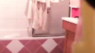 Skinny stepmom washing pussy in bathroom