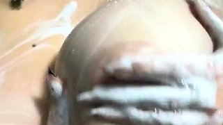 Busty curly brunette with big boobs fucks on couch