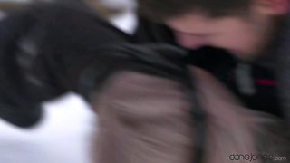 Kristof Cale's Passionate Couple in Snowy Heat