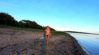 Russian Nudist on the River Shore