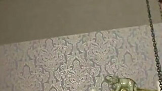 Humiliated chaining and penis squeezing