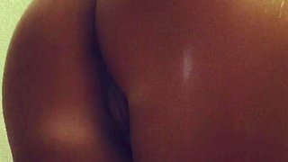 Busty curly brunette with big boobs fucks on couch
