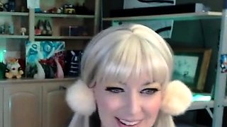 Beautiful blond babe with big boobs masturbating