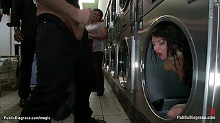Slave in waching machine in public