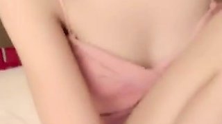Kinky Asian teen and her sex toys