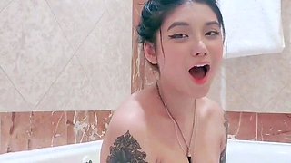 Busty babe playing with her big boobs