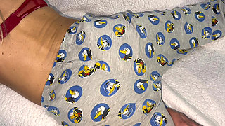 Stepmom was lying reading a book and helped to cum on her hot elastic ass