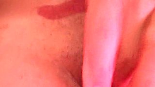 Steaming and kinky dark haired pleasing herself.