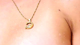 Amateur MILF in a short skirt jerks and sucks a cock