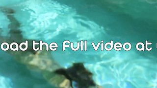 Slender Australian nude blondie swimming