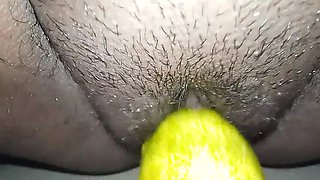 Indian girl Sakila homemade fuck with cucumber pressing her hairy pussy