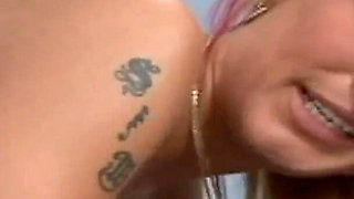 Alternative milf with tattoos and piercings taking it doggy style